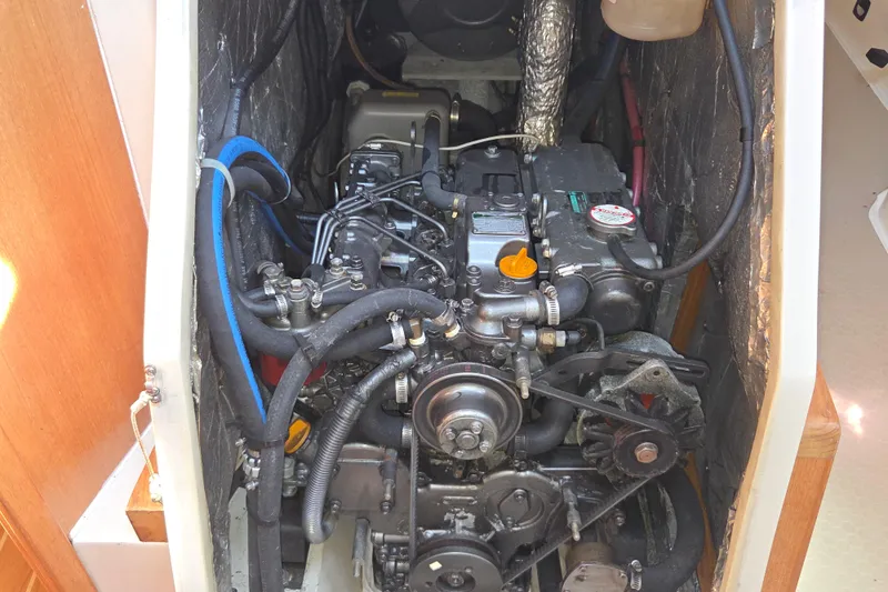  Yacht Photos Pics Engine compartment of a 2007 Catalina 42 MkII sailboat, showcasing mechanical components.