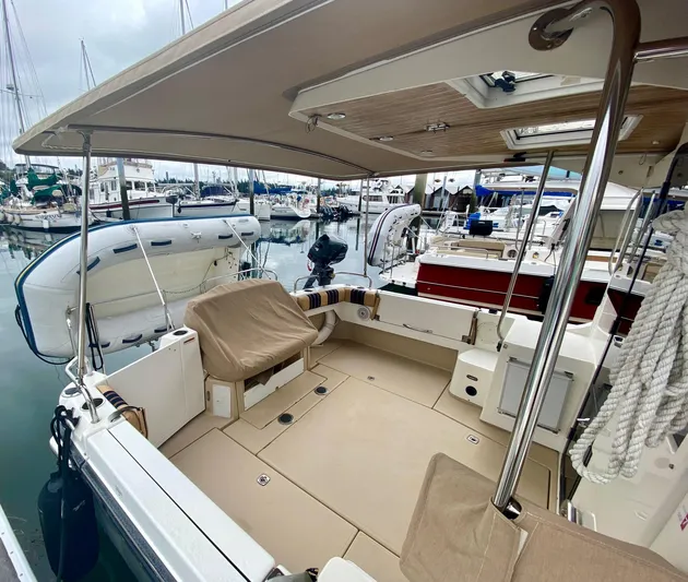 Sea Dreamer Yacht Photos Pics 2014 Cutwater 30 Sedan boat interior with seating, docked at marina.