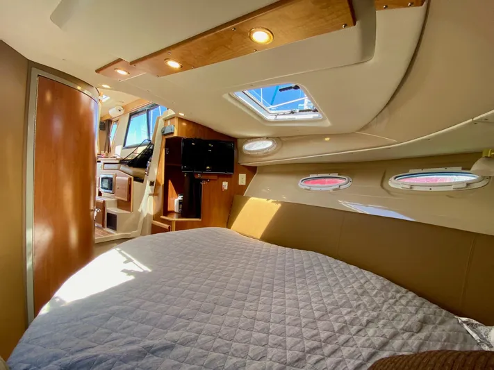 Sea Dreamer Yacht Photos Pics 2014 Cutwater 30 Sedan interior with cozy cabin and modern amenities.