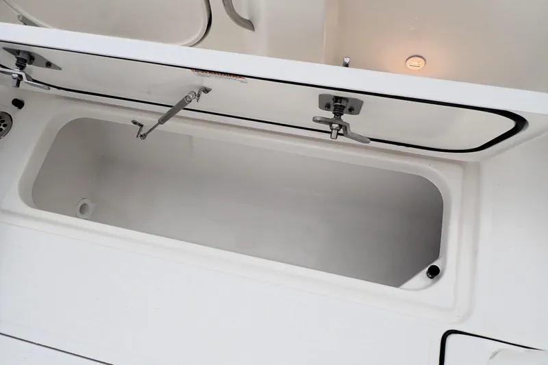  Yacht Photos Pics Open storage compartment on 2024 Pursuit S 288 Sport boat.