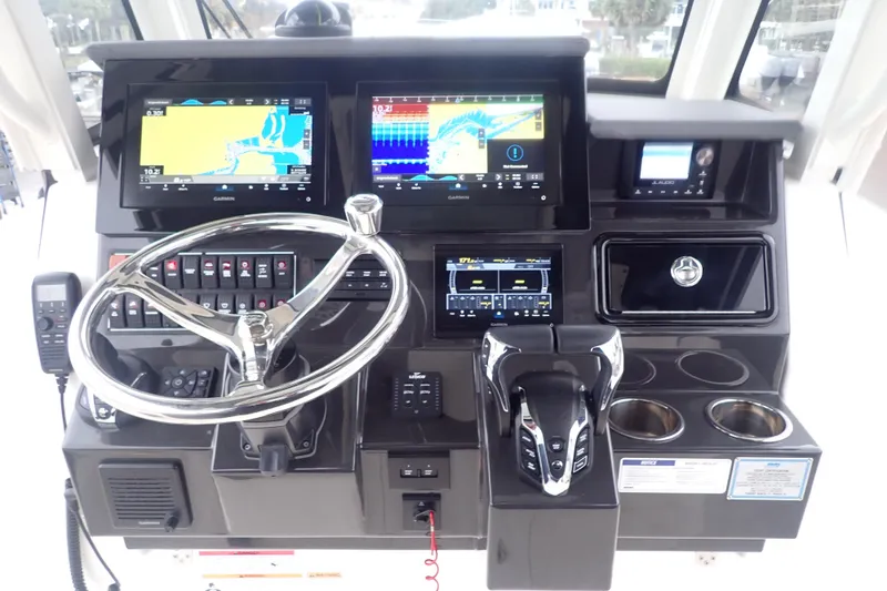  Yacht Photos Pics 2024 Pursuit S 288 Sport helm with advanced navigation and control systems.