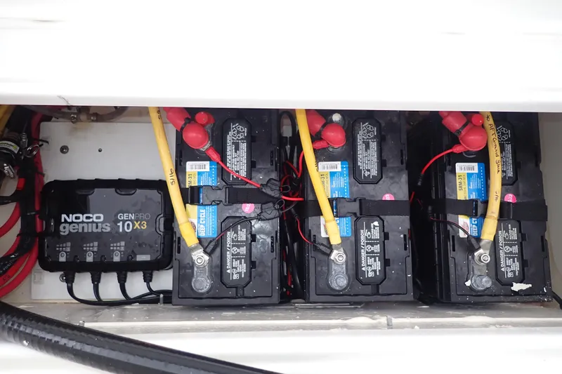  Yacht Photos Pics 2024 Pursuit S 288 Sport boat battery compartment with NOCO Genius GENPRO 10X3 charger.