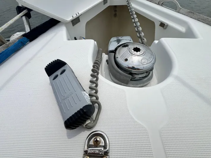 Miss Charlotte Yacht Photos Pics Anchor windlass on 2007 Jeanneau Sun Odyssey 39i sailboat deck.