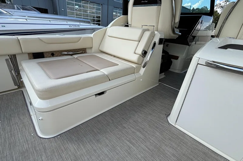  Yacht Photos Pics 2021 Chris-Craft Calypso 35 interior with beige seating and modern design.