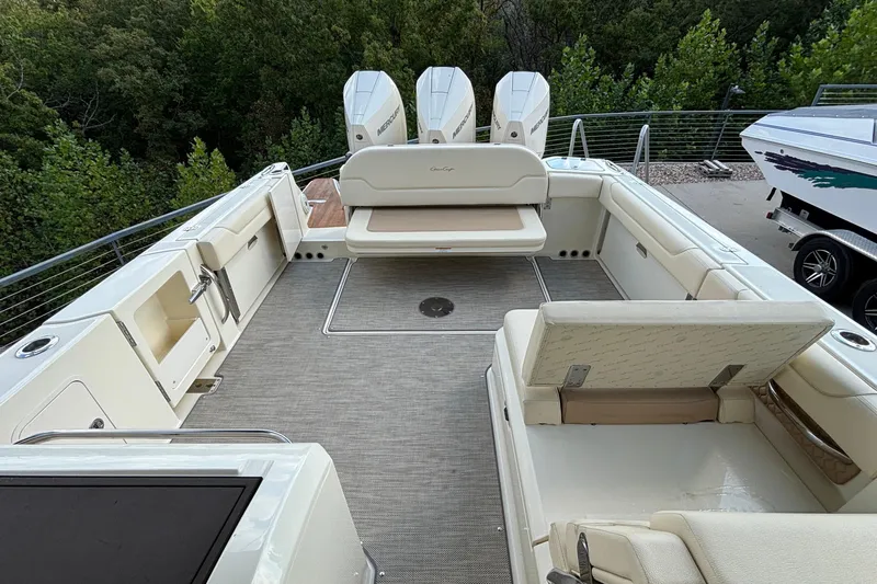  Yacht Photos Pics 2021 Chris-Craft Calypso 35 boat interior with seating and outboard motors.