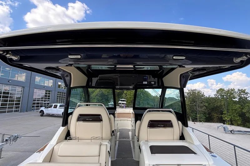  Yacht Photos Pics 2021 Chris-Craft Calypso 35 boat interior with luxurious seating and modern design.