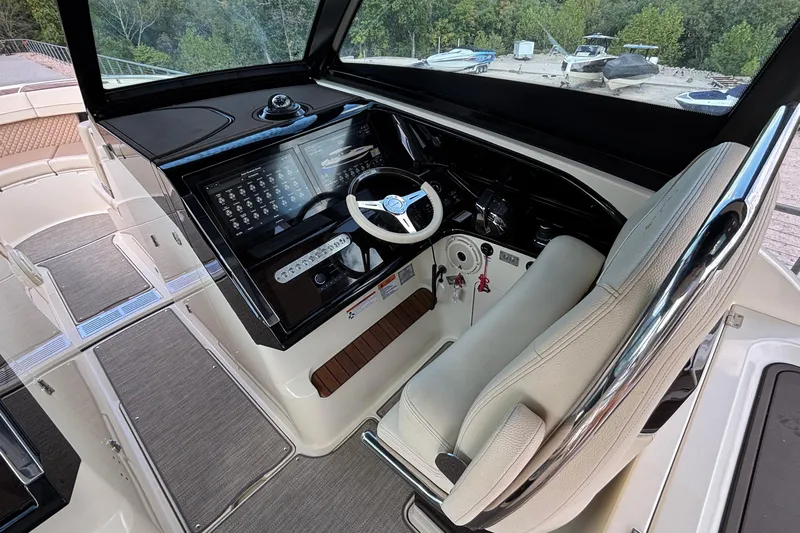  Yacht Photos Pics 2021 Chris-Craft Calypso 35 helm with modern controls and comfortable seating.