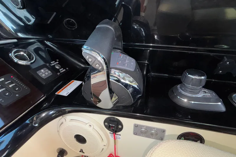  Yacht Photos Pics Control panel of 2021 Chris-Craft Calypso 35 boat with throttle and joystick.