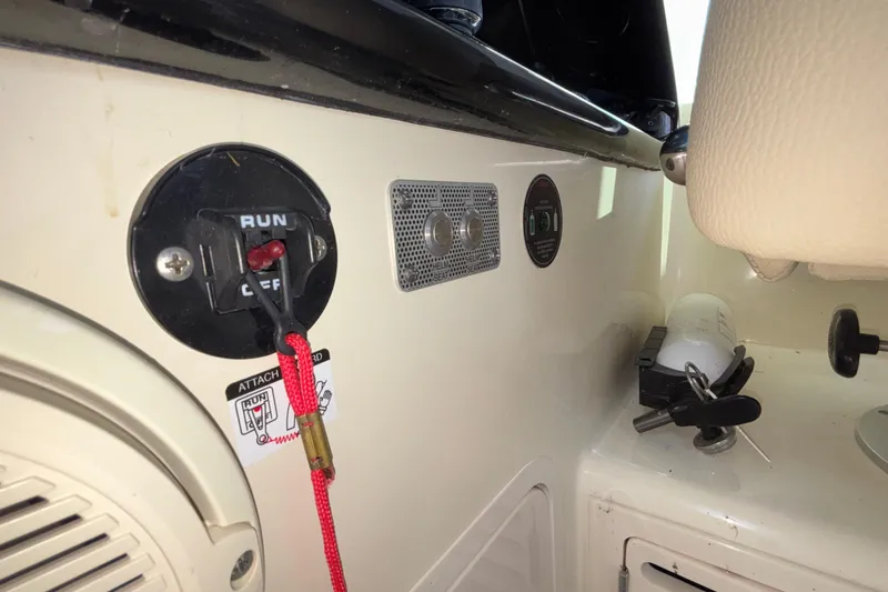  Yacht Photos Pics Control panel of a 2021 Chris-Craft Calypso 35 boat with safety features.