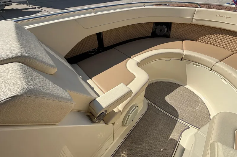  Yacht Photos Pics Luxurious seating area on a 2021 Chris-Craft Calypso 35 boat, featuring elegant upholstery.