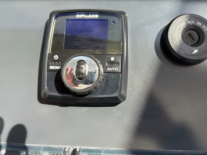  Yacht Photos Pics Control panel on 2024 Jeanneau DB43 boat dashboard with Zipwake system.