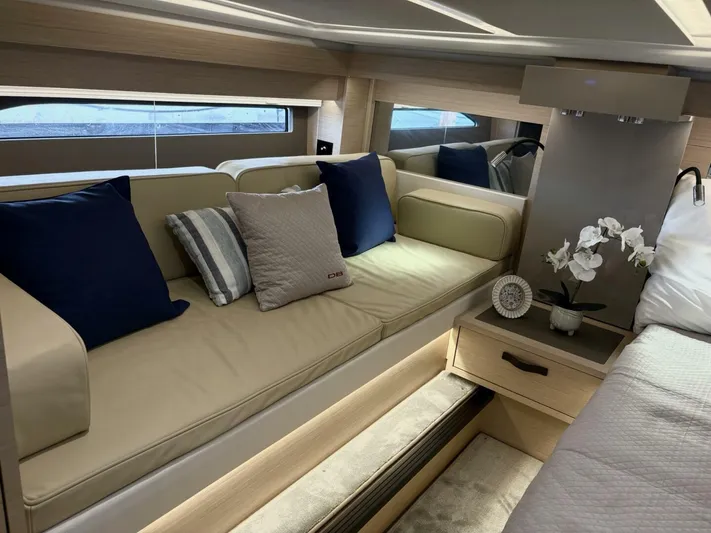  Yacht Photos Pics Luxurious interior of 2024 Jeanneau DB43 yacht with elegant seating and decor.