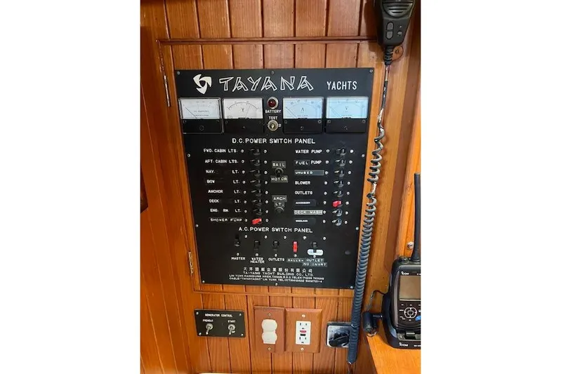 Southern Cross Yacht Photos Pics Control panel of a 1987 Tayana Vancouver 42 yacht with various switches and meters.