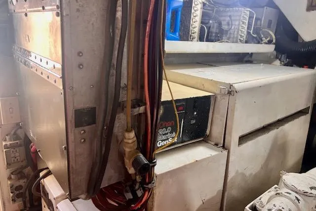 Abuelo Yacht Photos Pics 1989 HATTERES Convertible engine room with generator and wiring.