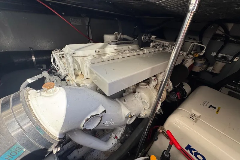 Pearl Yacht Photos Pics Engine room of 1994 Sea Ray 440 Express Bridge with visible components and machinery.