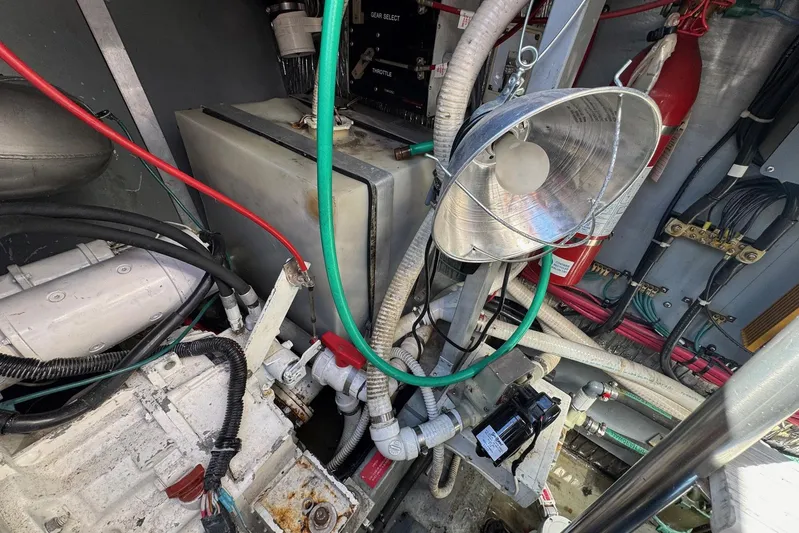 Pearl Yacht Photos Pics Engine room of a 1994 Sea Ray 440 Express Bridge with wiring and equipment.