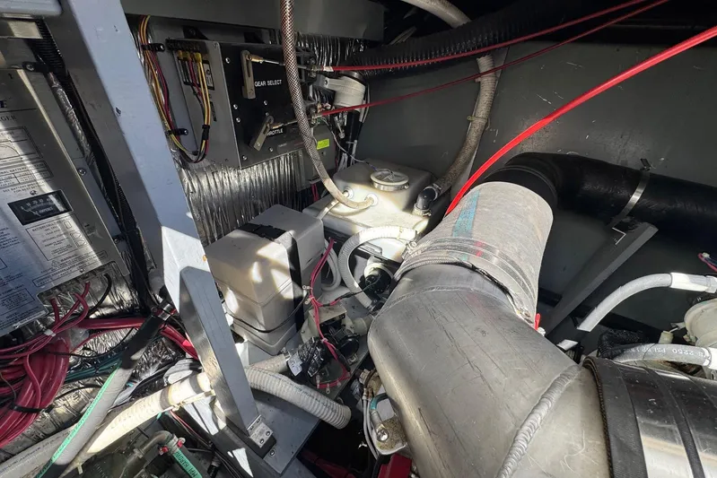 Pearl Yacht Photos Pics Engine room of 1994 Sea Ray 440 Express Bridge with wiring and mechanical components.