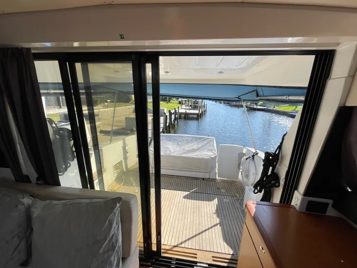 Funkytown 2 Yacht Photos Pics Interior view of 2014 Jeanneau NC 11 yacht, showcasing deck and waterway.