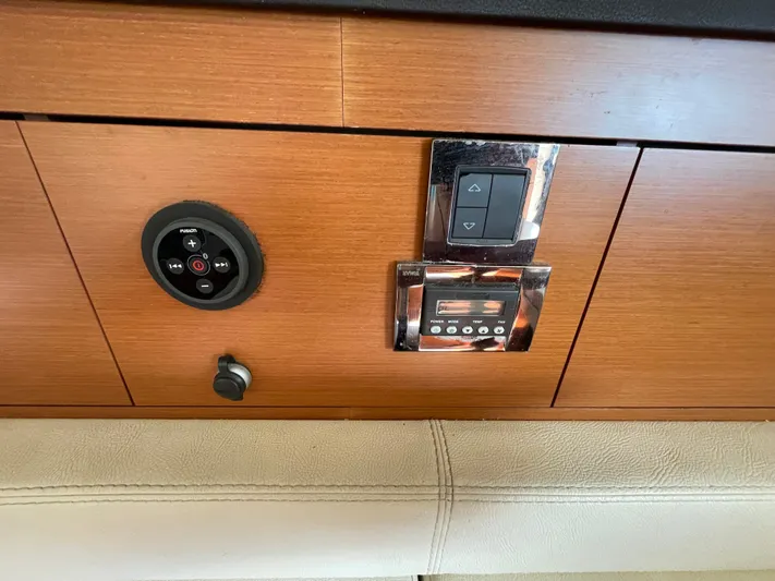 Funkytown 2 Yacht Photos Pics Control panel on 2014 Jeanneau NC 11 boat with audio and climate controls.