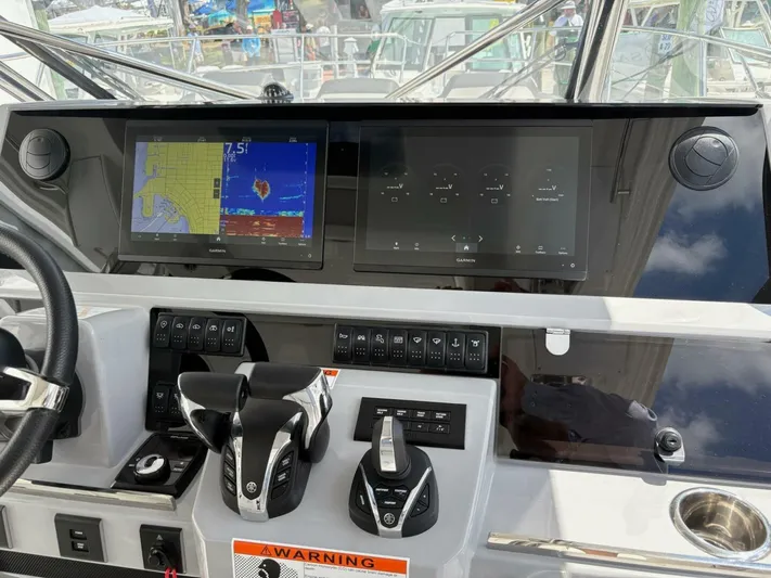 Jeanneau Yacht Photos Pics 2024 Jeanneau 12.5 Walk helm with advanced navigation displays and controls.