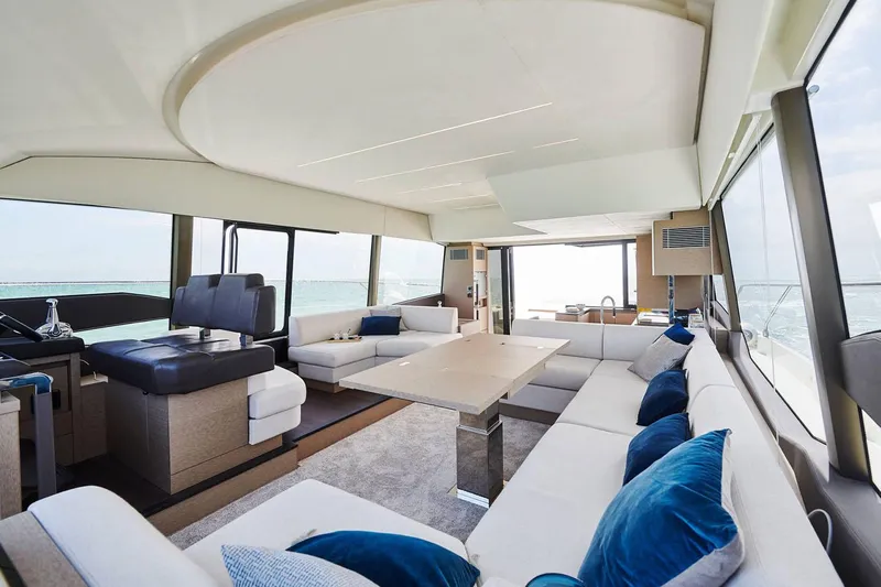  Yacht Photos Pics Manufacturer Provided Image: Luxurious interior of 2024 Prestige 590 yacht with elegant seating and ocean views.
