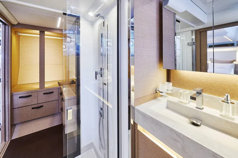  Yacht Photos Pics Manufacturer Provided Image: Luxurious bathroom interior of 2024 Prestige 590 yacht with modern fixtures and elegant design.