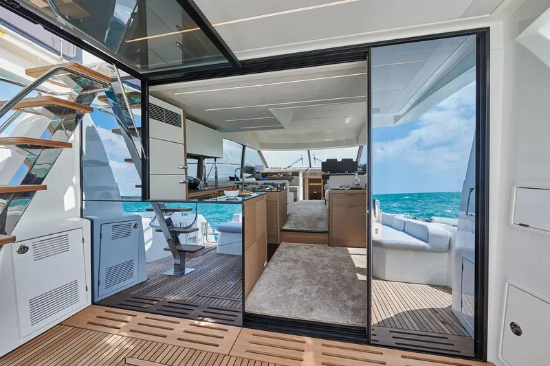  Yacht Photos Pics Manufacturer Provided Image: Luxurious 2024 Prestige 590 yacht interior with ocean view and modern design.