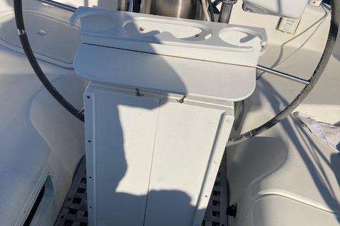 Cockpit of 1985 Pearson 36-2 sailboat with steering wheel and control panel.