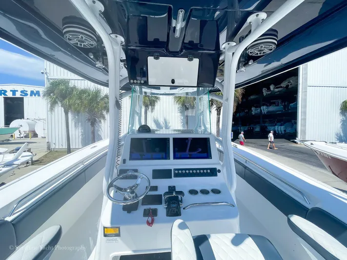 Higher Power Yacht Photos Pics 2017 Cape Horn 36XS boat cockpit with dual screens and steering wheel.
