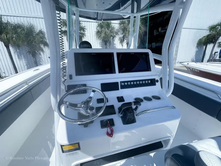 Higher Power Yacht Photos Pics 2017 Cape Horn 36XS boat console with dual screens and steering wheel.