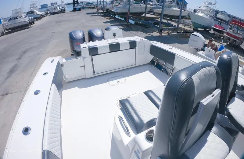 Higher Power Yacht Photos Pics 2017 Cape Horn 36XS boat interior with seating and twin outboard motors.