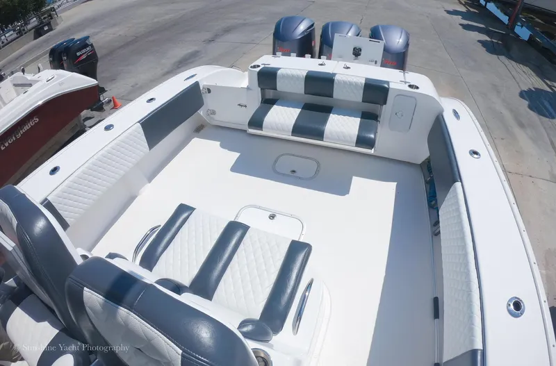 Higher Power Yacht Photos Pics 2017 Cape Horn 36XS boat interior with seating and twin outboard motors.
