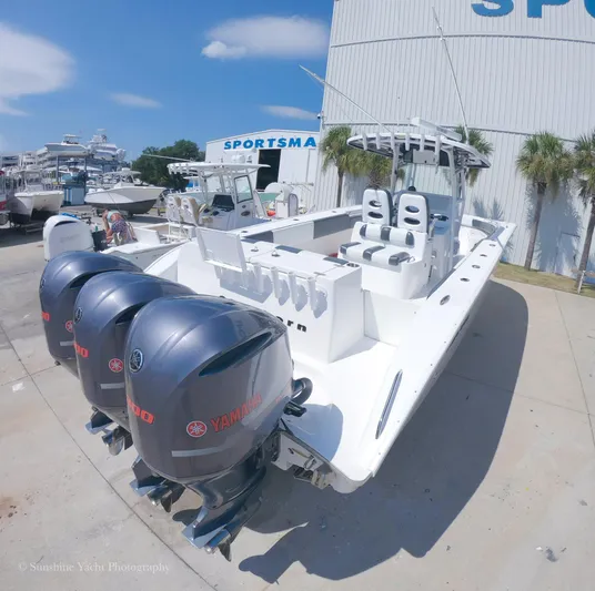 Higher Power Yacht Photos Pics 2017 Cape Horn 36XS boat with triple Yamaha engines at a marina.