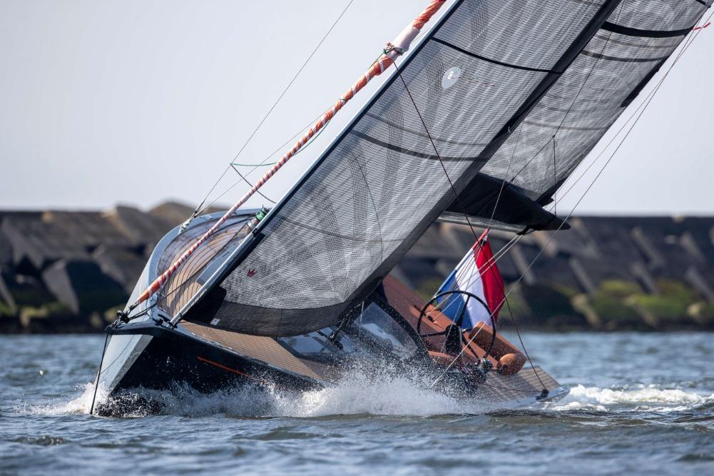 Saffier SE 33 Life 2026 sailing yacht on water with Dutch flag.