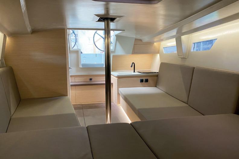 Interior of 2026 Saffier SE 33 Life yacht, featuring modern seating and kitchenette.