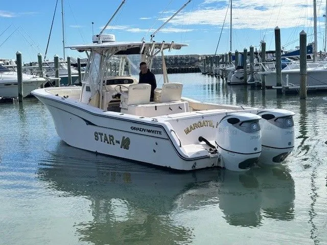 Star-k-2 Yacht Photos Pics 2008 Grady-White Bimini 306 boat docked in marina with twin engines.
