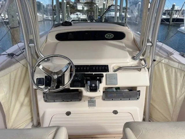 Star-k-2 Yacht Photos Pics 2008 Grady-White Bimini 306 boat dashboard with steering wheel and controls.