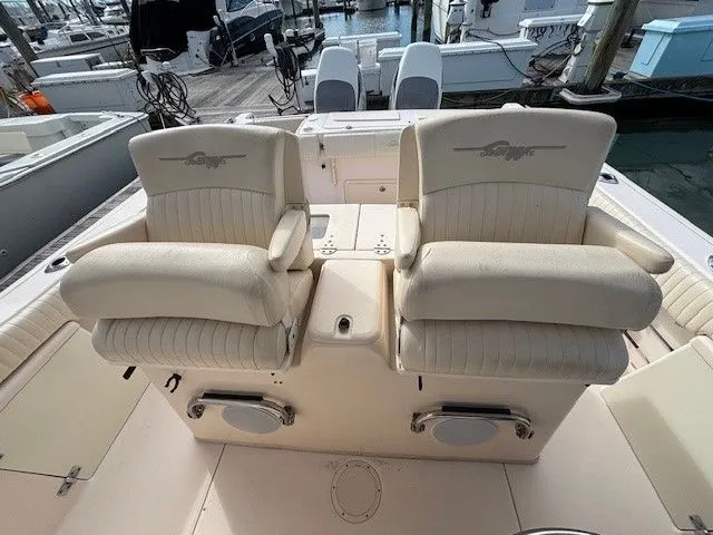 Star-k-2 Yacht Photos Pics 2008 Grady-White Bimini 306 boat seats at marina, showcasing luxury and comfort.