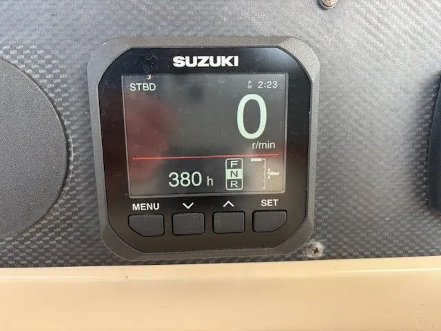 Star-k-2 Yacht Photos Pics Suzuki display on 2008 Grady-White Bimini 306 showing 380 hours and 0 RPM.