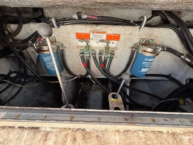 Star-k-2 Yacht Photos Pics Engine compartment of 2008 Grady-White Bimini 306 with Yamaha filters and wiring.