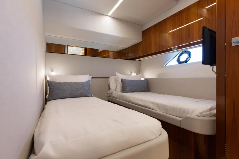 Hermosa Yacht Photos Pics Interior of 2022 Riviera 645 SUV yacht with twin beds and modern design.