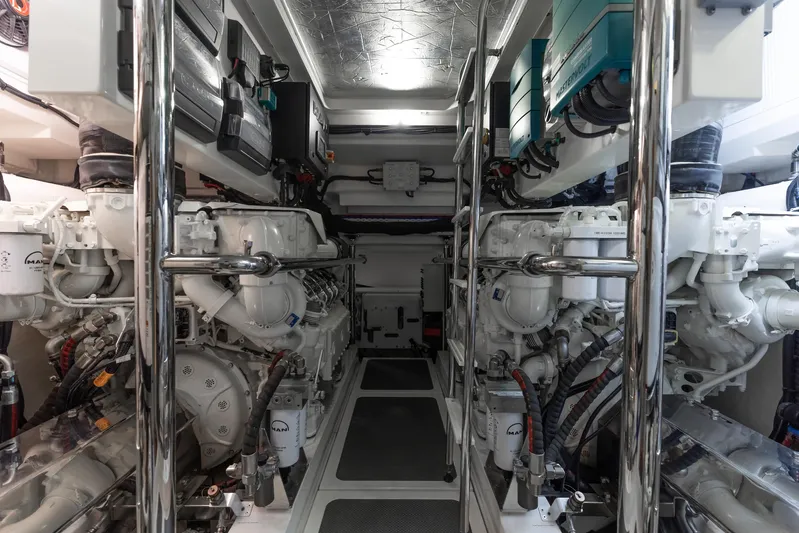 Hermosa Yacht Photos Pics Engine room of 2022 Riviera 645 SUV yacht, showcasing advanced machinery and equipment.