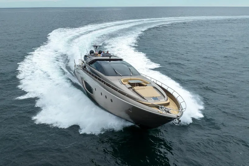 Da Rose Yacht Photos Pics Luxurious 2012 Riva 86' DOMINO yacht cruising on open sea, creating elegant waves.