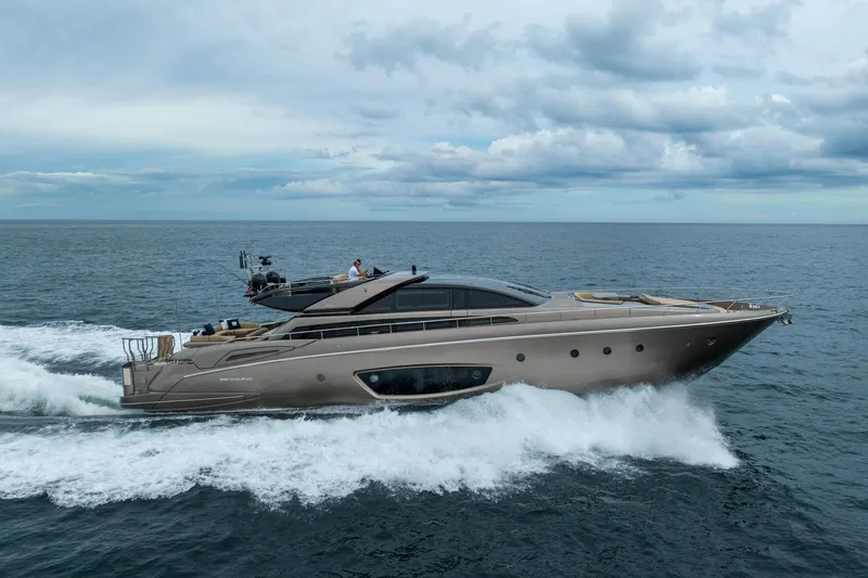 Da Rose Yacht Photos Pics Luxurious 2012 Riva 86' DOMINO yacht cruising on open sea under cloudy sky.