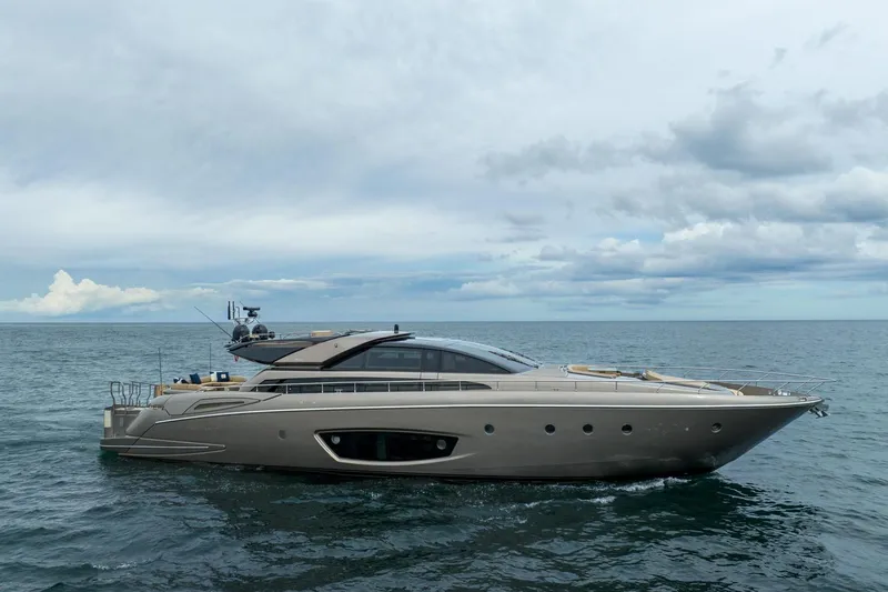 Da Rose Yacht Photos Pics Luxury 2012 Riva 86' DOMINO yacht cruising on open sea under cloudy sky.