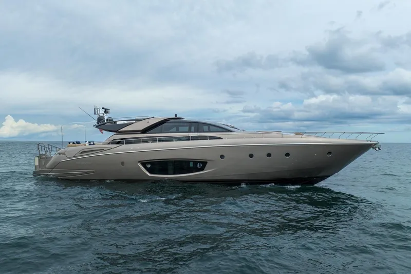 Da Rose Yacht Photos Pics Luxury 2012 Riva 86' DOMINO yacht cruising on open sea under cloudy sky.