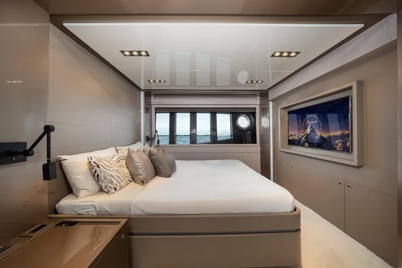 Da Rose Yacht Photos Pics Luxurious bedroom interior on 2012 Riva 86' DOMINO yacht with modern decor and ocean view.