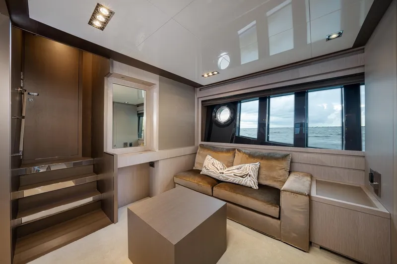 Da Rose Yacht Photos Pics Luxurious interior of 2012 Riva 86' DOMINO yacht with modern sofa and ocean view.