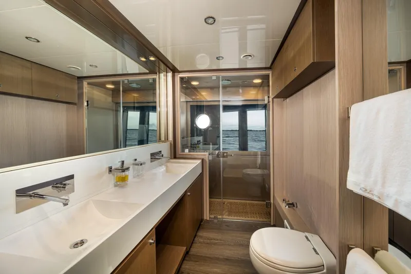 Da Rose Yacht Photos Pics Luxurious bathroom interior of 2012 Riva 86' DOMINO yacht with modern fixtures.