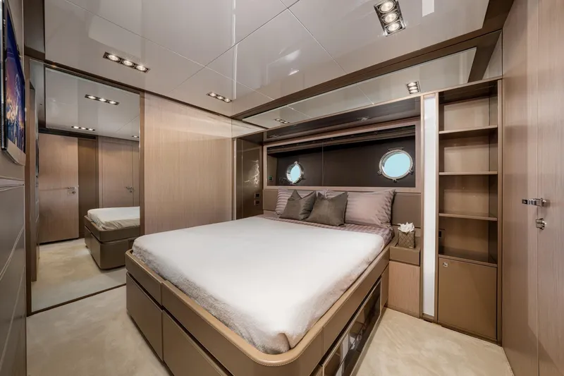 Da Rose Yacht Photos Pics Luxurious bedroom interior on 2012 Riva 86' DOMINO yacht, featuring modern design and elegant furnishings.